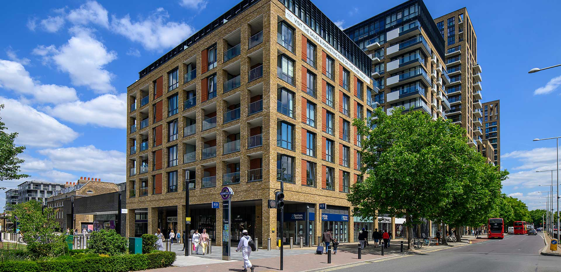 Wide angle view of a contemporary apartment building on a sunny day.