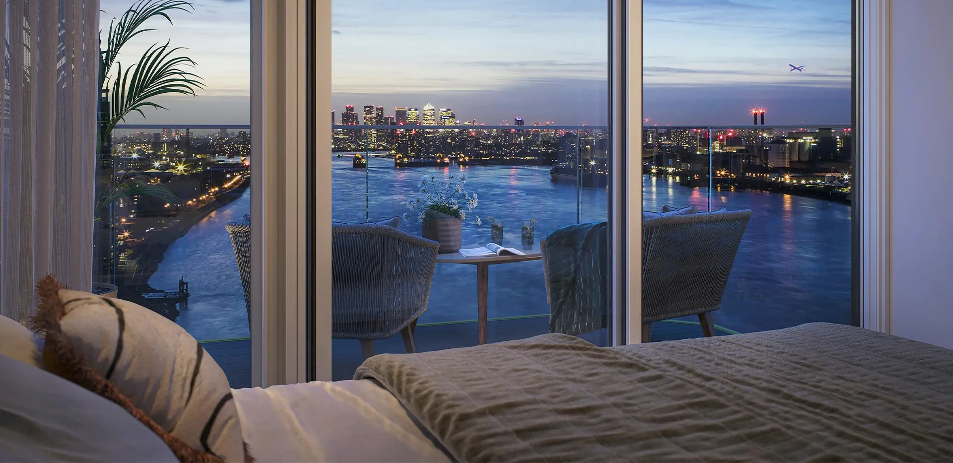 Spectacular River Thames and London skyline night view from a private apartment balcony.