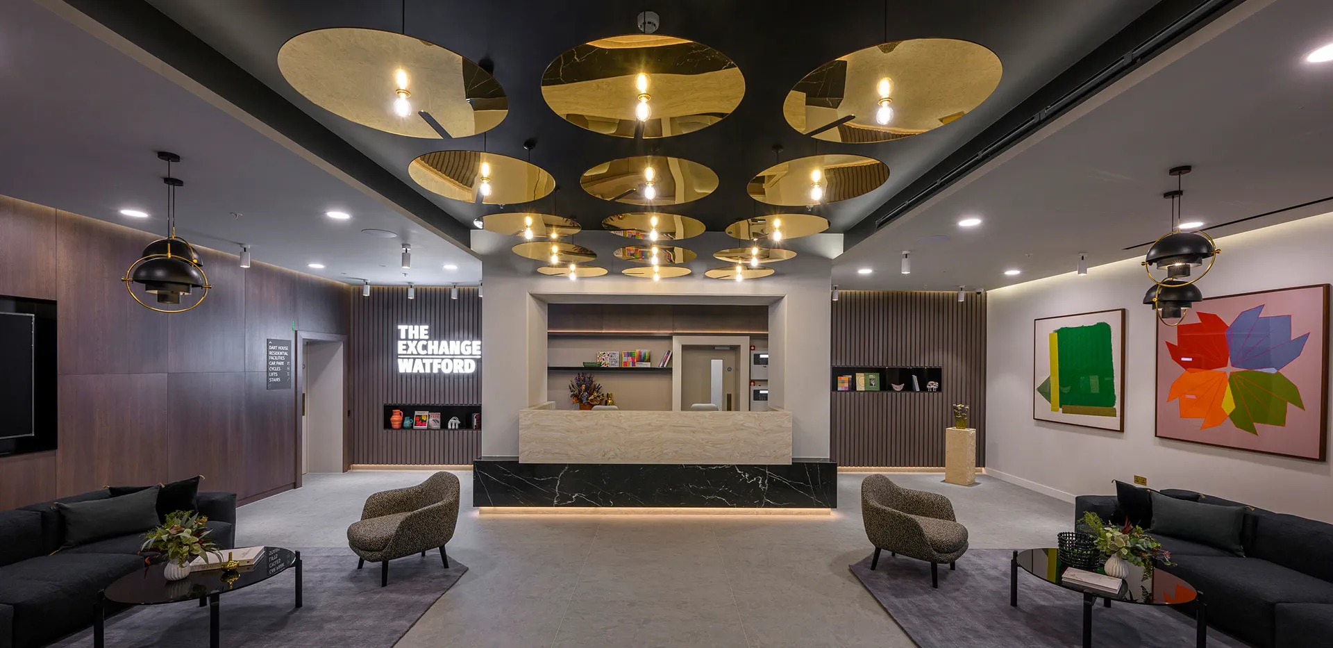 The Exchange Watford concierge desk and resident lounge area with modern design