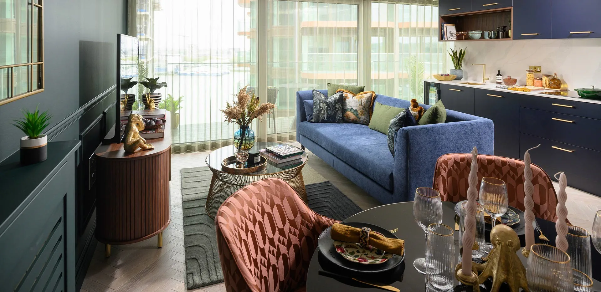 Modern open-plan living and dining area in a Royal Arsenal Riverside apartment, Woolwich, London.