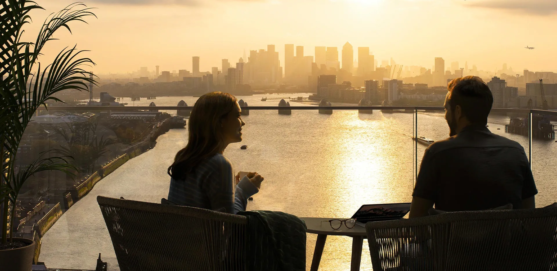 Scenic sunset views over the London skyline from a luxury balcony at Royal Arsenal Riverside.
