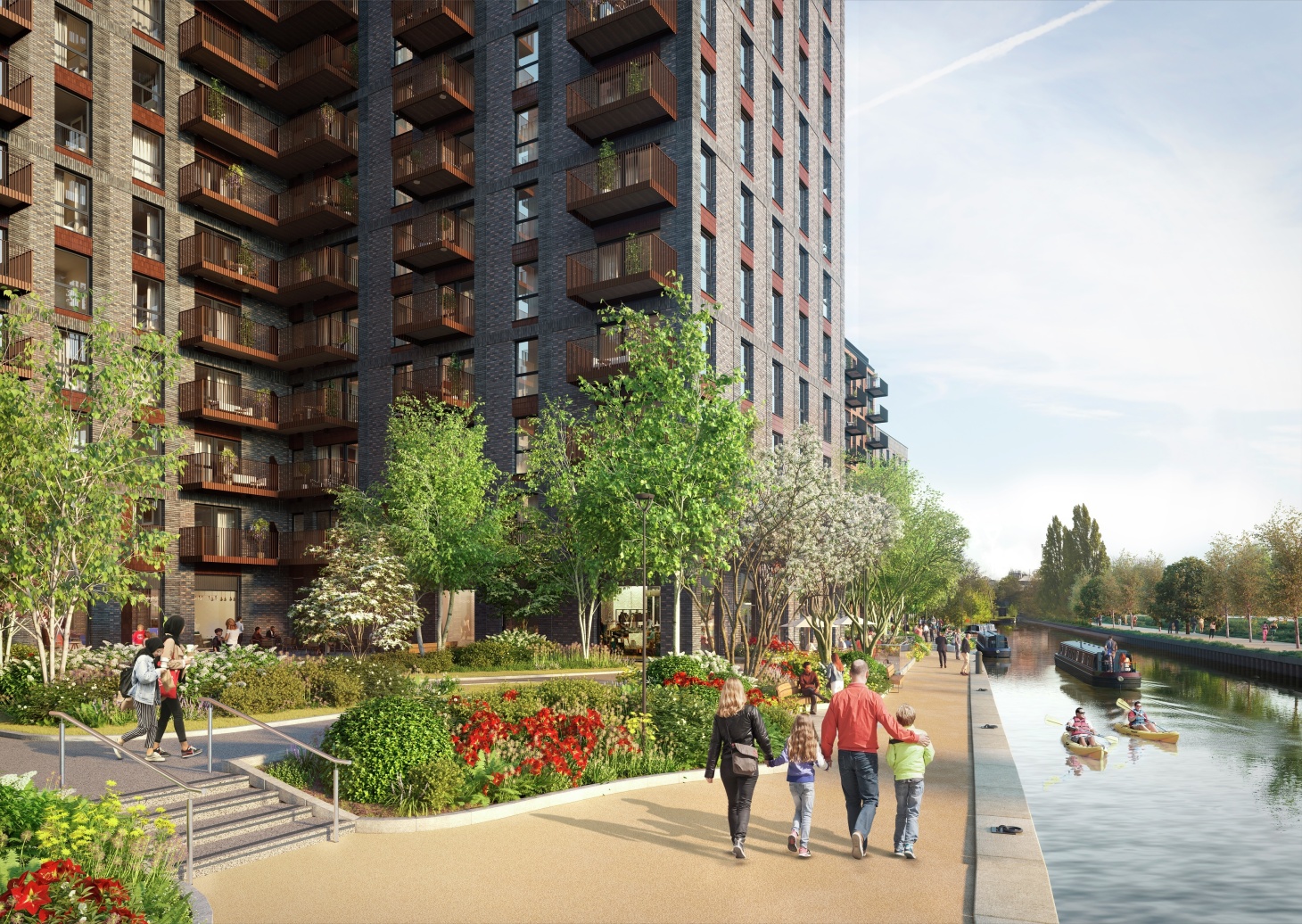 A modern London apartment development alongside the Grand Union Canal, showing a family and kayakers.